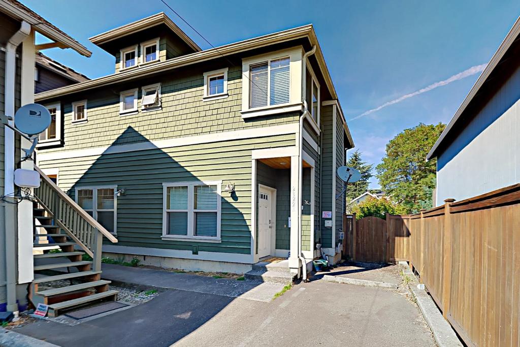 a house with a fence in front of it at Westside Escape in Seattle