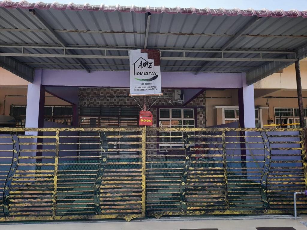 a arena with a sign that reads arena library at AMZ HOMESTAY in Masjid Tanah