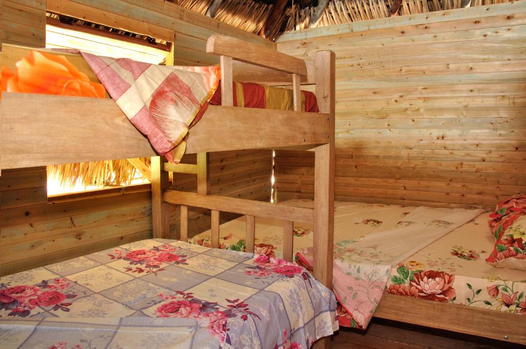 Voodi või voodid majutusasutuse Hostal Playa Blanca toas