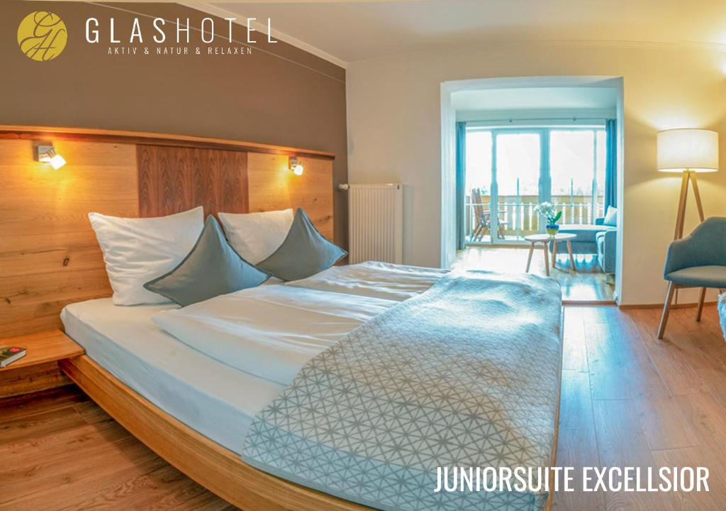 Postel nebo postele na pokoji v ubytování Glashotel