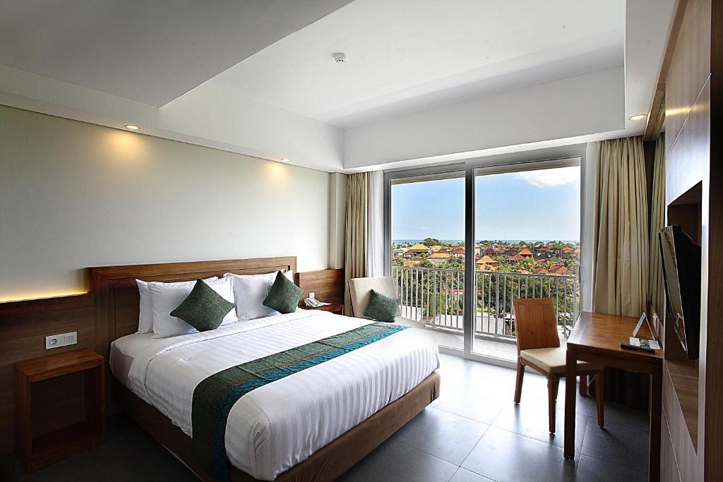 Кровать или кровати в номере Paragon Hotel Seminyak