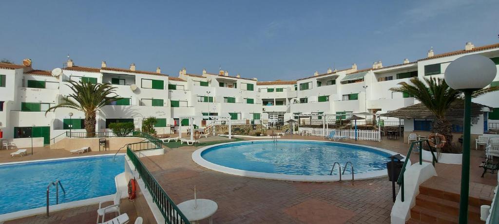 Bazén v ubytování Vacaciones Alondras Park D209 nebo v jeho okolí