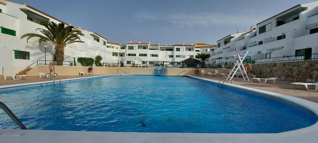 Bazén v ubytování Vacaciones Alondras Park D209 nebo v jeho okolí