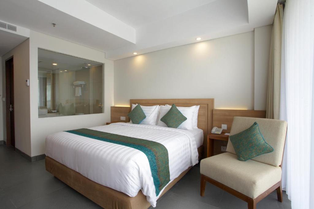 Кровать или кровати в номере Paragon Hotel Seminyak