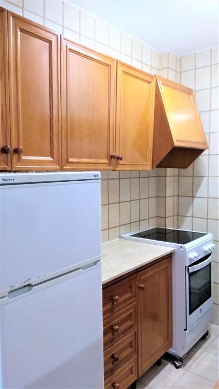 A kitchen or kitchenette at PEÑISMAR FiNCAS VAN CAMP