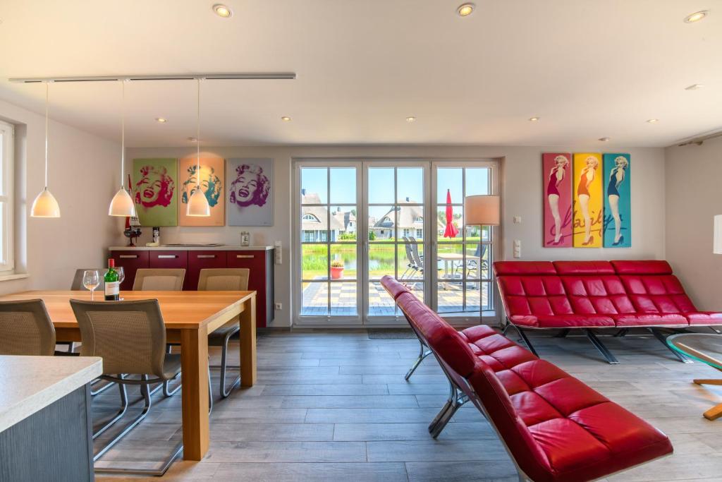 Posezení v ubytování Ferienhaus Haubenlerche 63 - Haus Marilyn