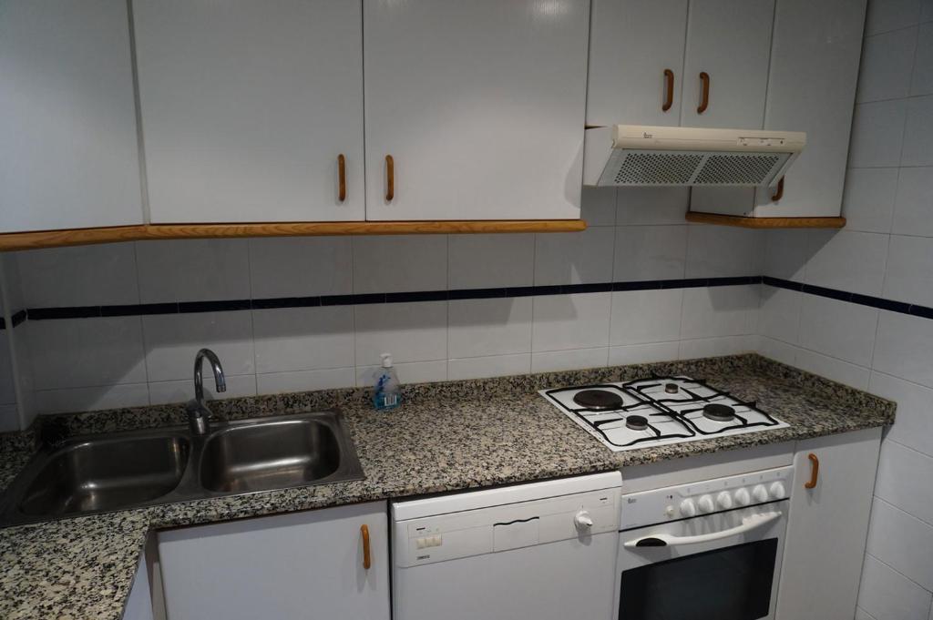 Kuchyň nebo kuchyňský kout v ubytování Apartamento Alcoy