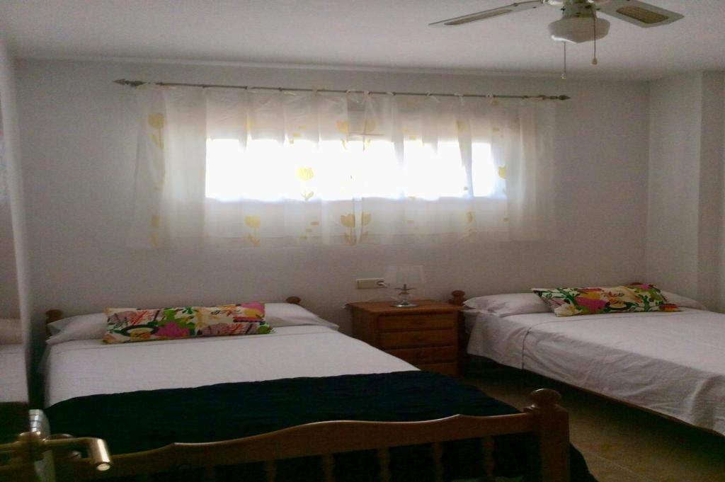 Postel nebo postele na pokoji v ubytování Apartamento Alcoy