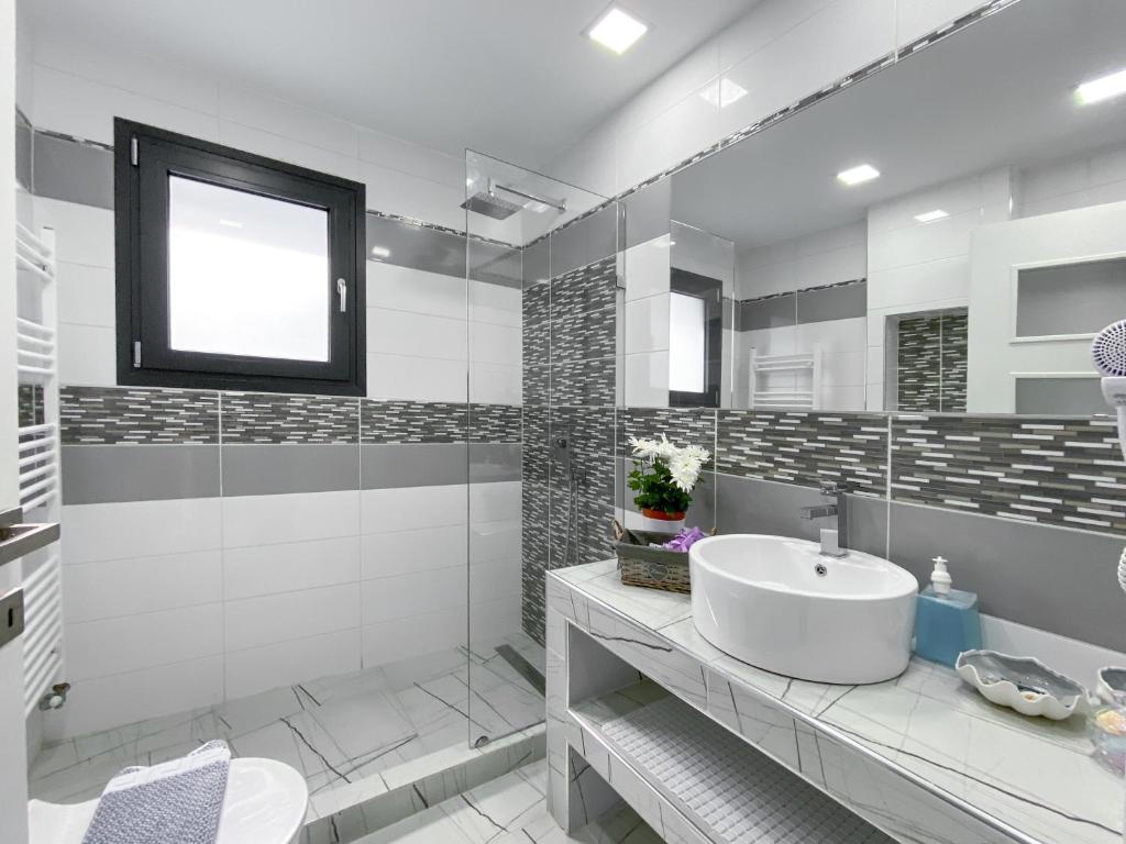 A bathroom at Diamond Luxury Villa Corfu 6 Bedroom Luxury Villa