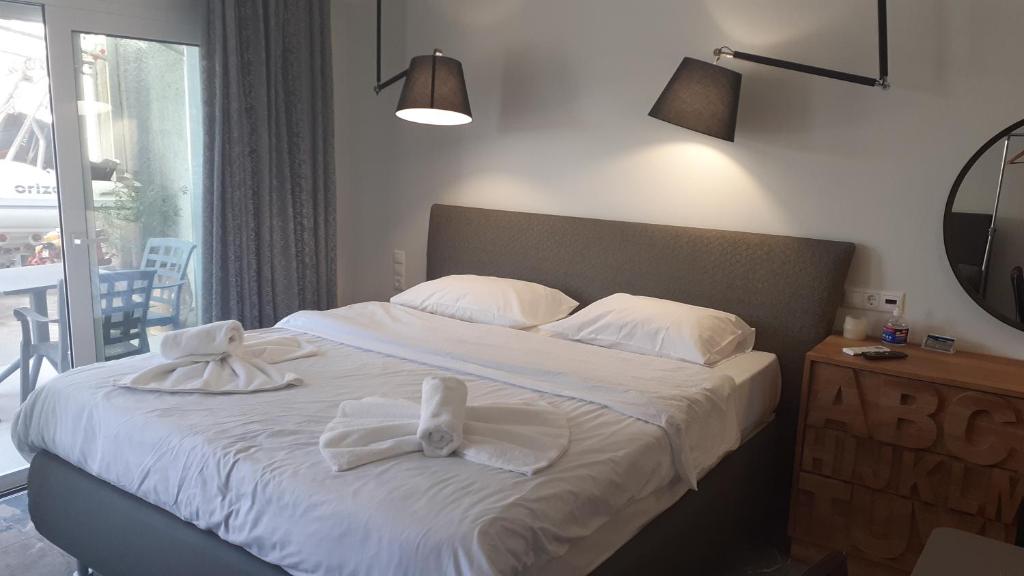 A bed or beds in a room at GIANNIS