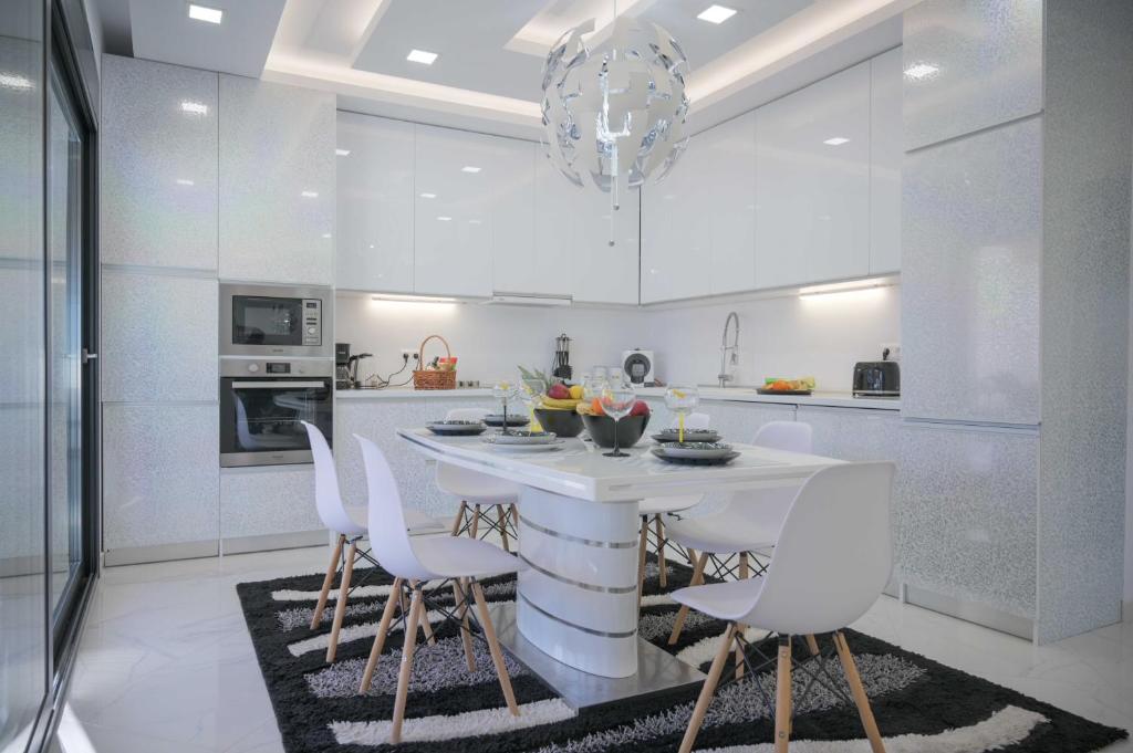 A kitchen or kitchenette at Diamond Luxury Villa Corfu 6 Bedroom Luxury Villa