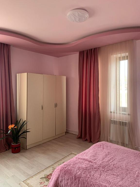 Postel nebo postele na pokoji v ubytování ABO
