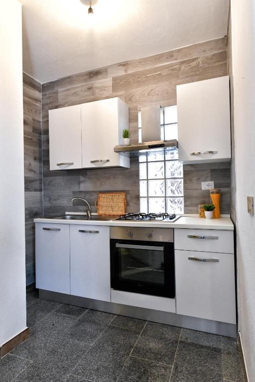 Kuchyň nebo kuchyňský kout v ubytování Residence Chiaro di Luna
