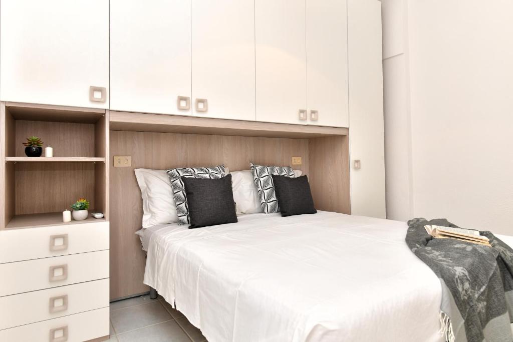 Postel nebo postele na pokoji v ubytování Residence Chiaro di Luna