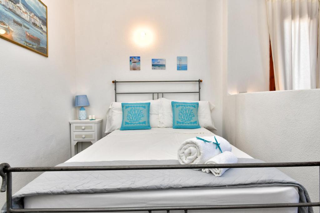 Postel nebo postele na pokoji v ubytování Residence Chiaro di Luna