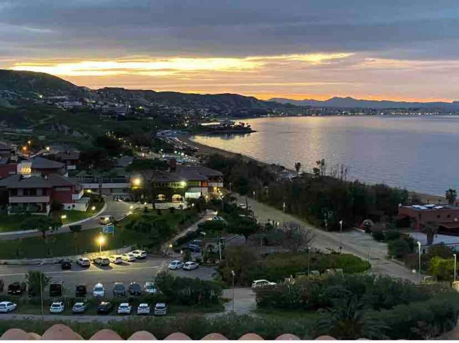 a view of a town with a harbor and the water at Belvedere Lacinio -Casa Vacanze- in Crotone