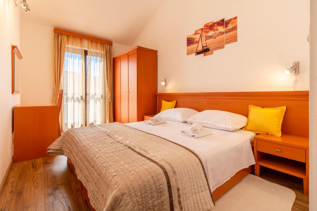 Posteľ alebo postele v izbe v ubytovaní Sunny beach apartment Lavica