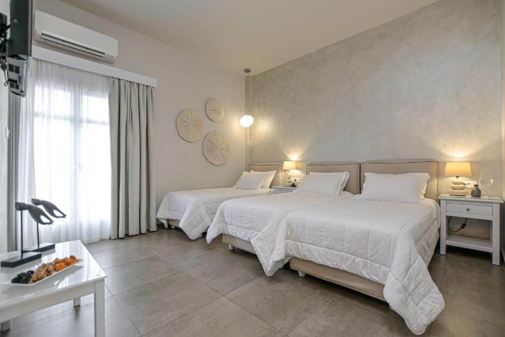 Voodi või voodid majutusasutuse Hotel Grotta toas