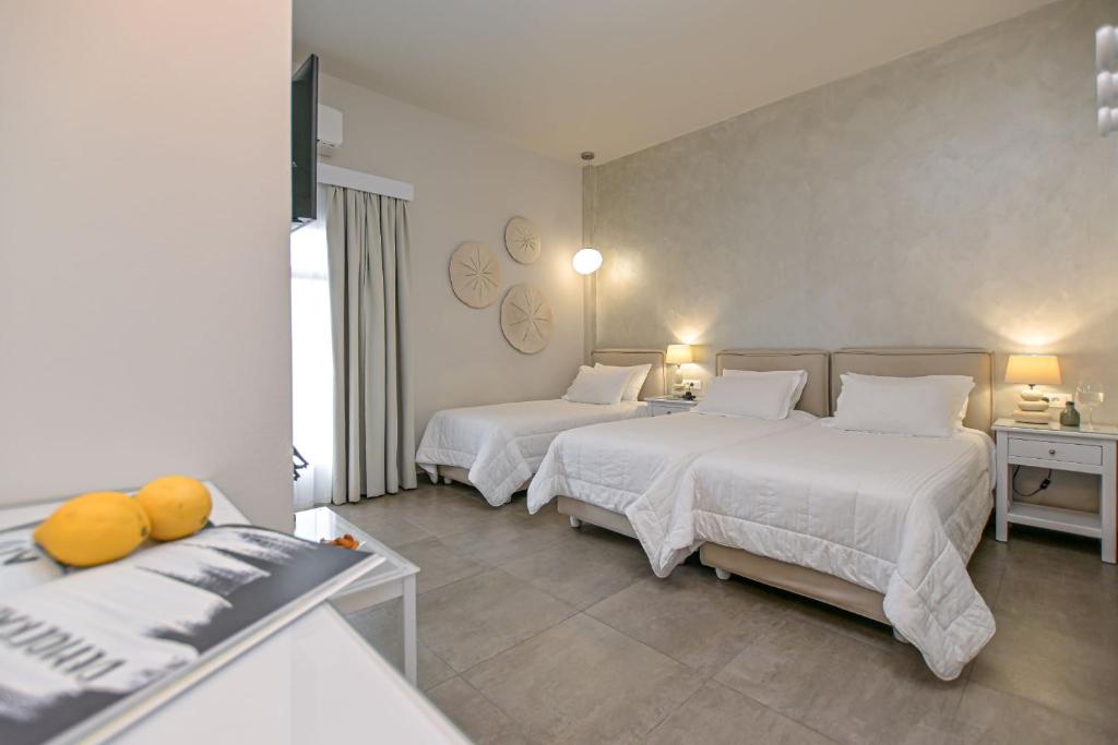 Voodi või voodid majutusasutuse Hotel Grotta toas