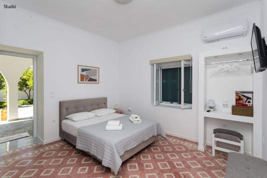 Postel nebo postele na pokoji v ubytování Aria Apartments