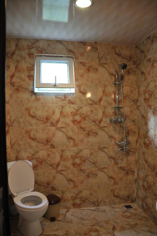 Koupelna v ubytování Guest House Ukimerioni