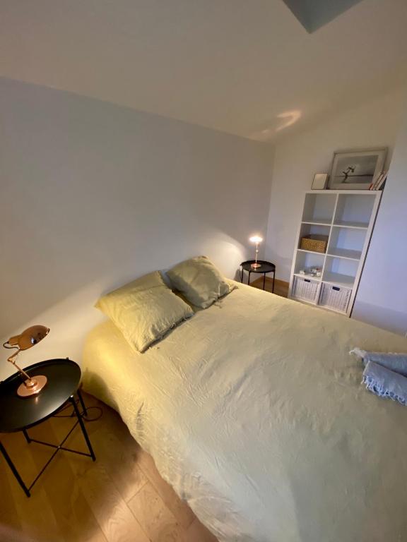 Postel nebo postele na pokoji v ubytování Maison spacieuse à deux pas de la plage …