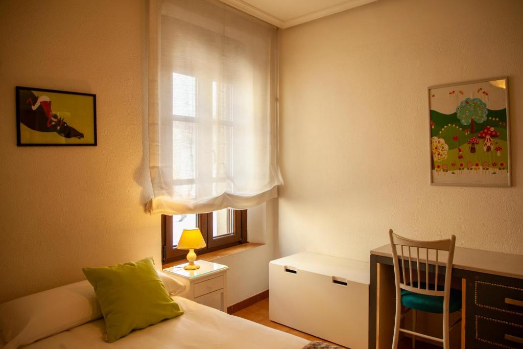 Postel nebo postele na pokoji v ubytování CASA TEO