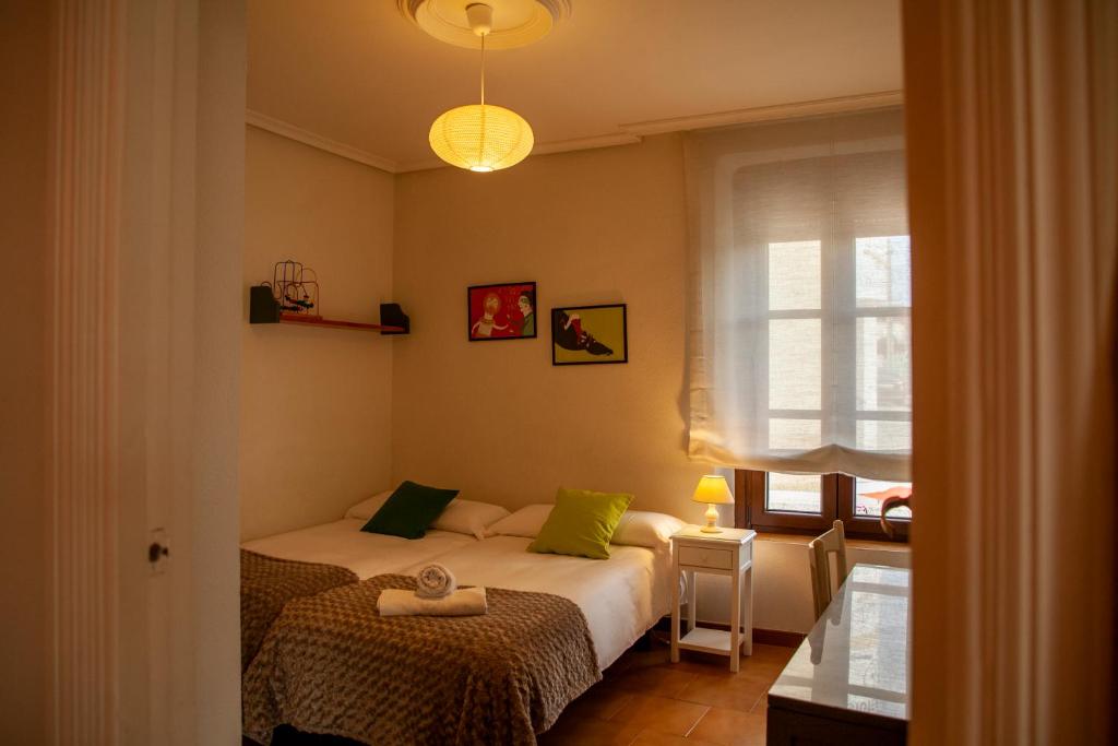 Postel nebo postele na pokoji v ubytování CASA TEO