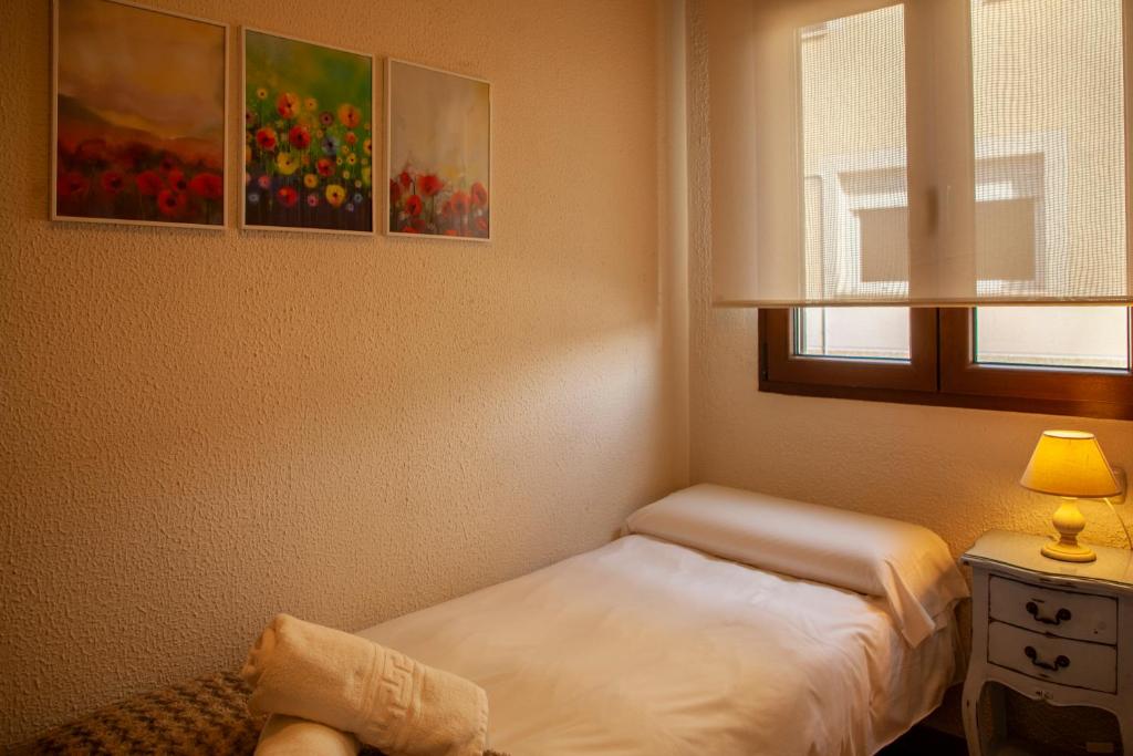 Postel nebo postele na pokoji v ubytování CASA TEO
