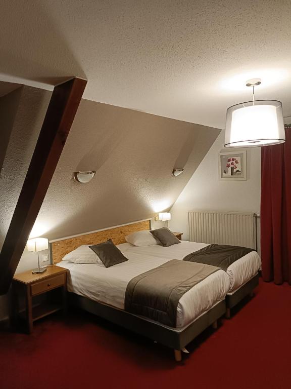 Postel nebo postele na pokoji v ubytování Hotel Beysang