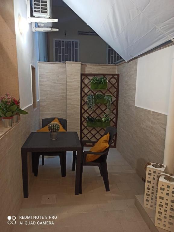 Posedenie v ubytovaní Appartamento con cortile a 30 mt. dal mare