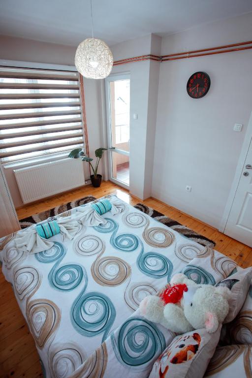 Rúm í herbergi á Apartman Marija