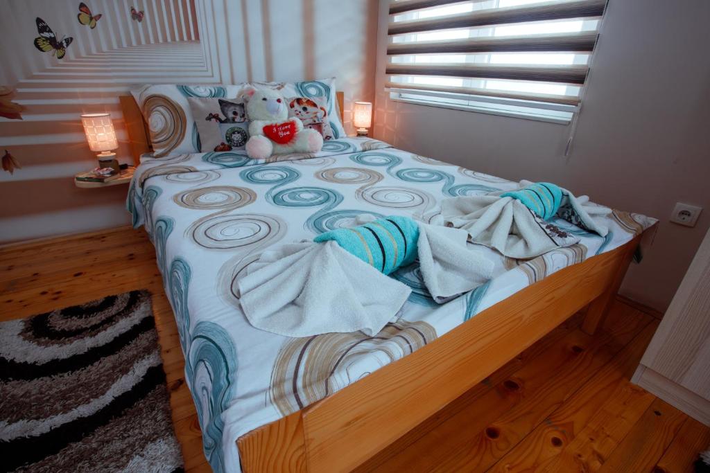 Rúm í herbergi á Apartman Marija