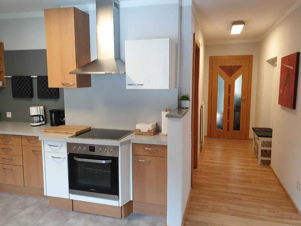 A kitchen or kitchenette at Appartement Waldfriede