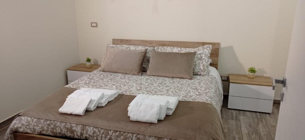 Posteľ alebo postele v izbe v ubytovaní I Mori APARTAMENT