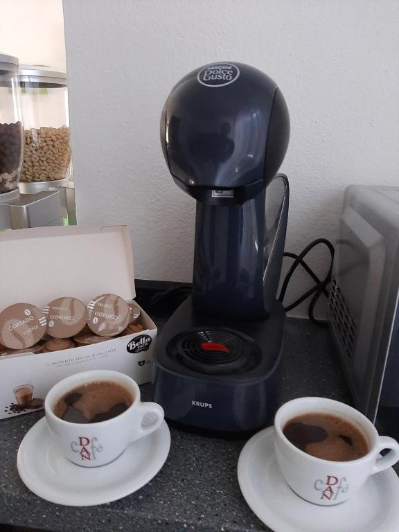 Příslušenství pro přípravu čaje a kávy v ubytování Holiday home Ivano