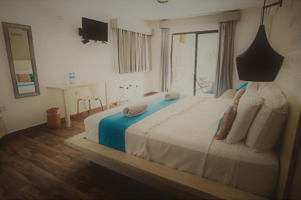 Postel nebo postele na pokoji v ubytování Hotel Luna De Plata