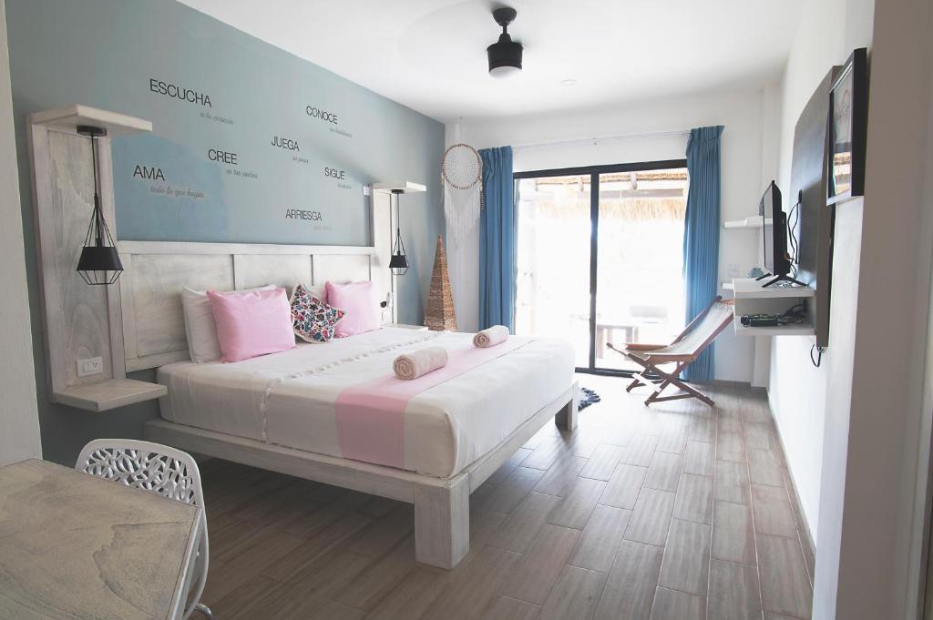 Postel nebo postele na pokoji v ubytování Hotel Luna De Plata