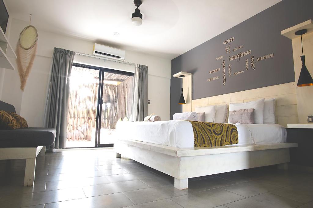 Postel nebo postele na pokoji v ubytování Hotel Luna De Plata