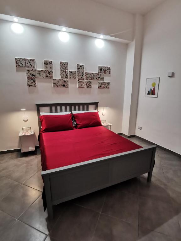 A bed or beds in a room at Octopus Vietri House