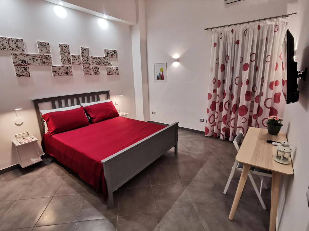 A bed or beds in a room at Octopus Vietri House