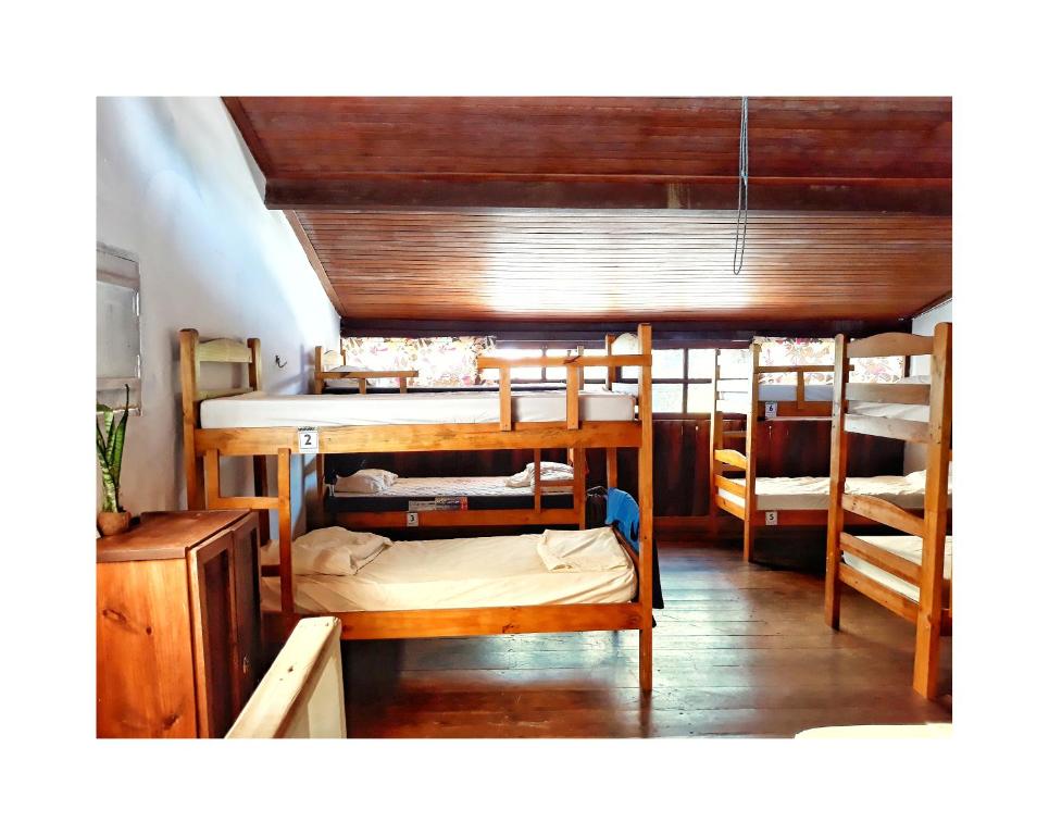 Postel nebo postele na pokoji v ubytování Tropicália Hostel e Pousada