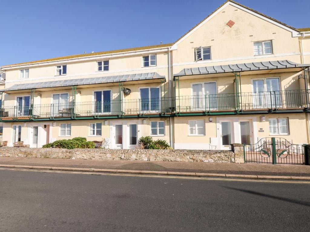 an apartment building on the side of the street at 6 Lyme Mews in Seaton