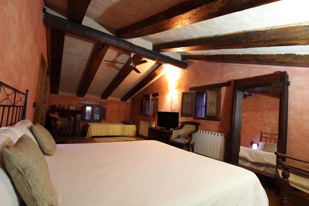 A bed or beds in a room at Finca Heredad La Boquilla