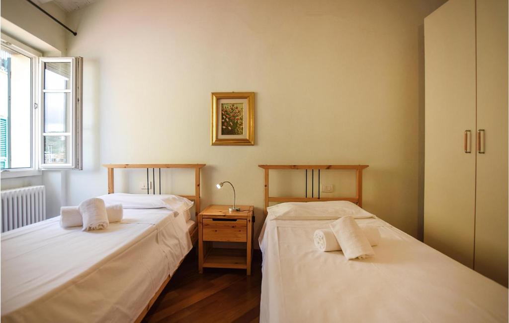 Posteľ alebo postele v izbe v ubytovaní Amazing Apartment In Imperia With Wifi