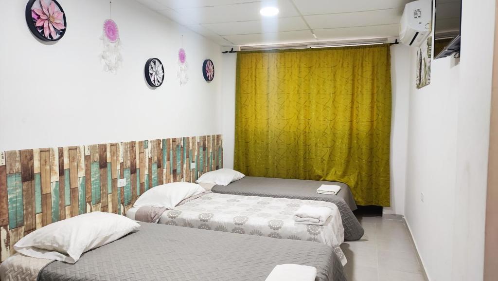 Postel nebo postele na pokoji v ubytování Apartamentos Las Piloneras