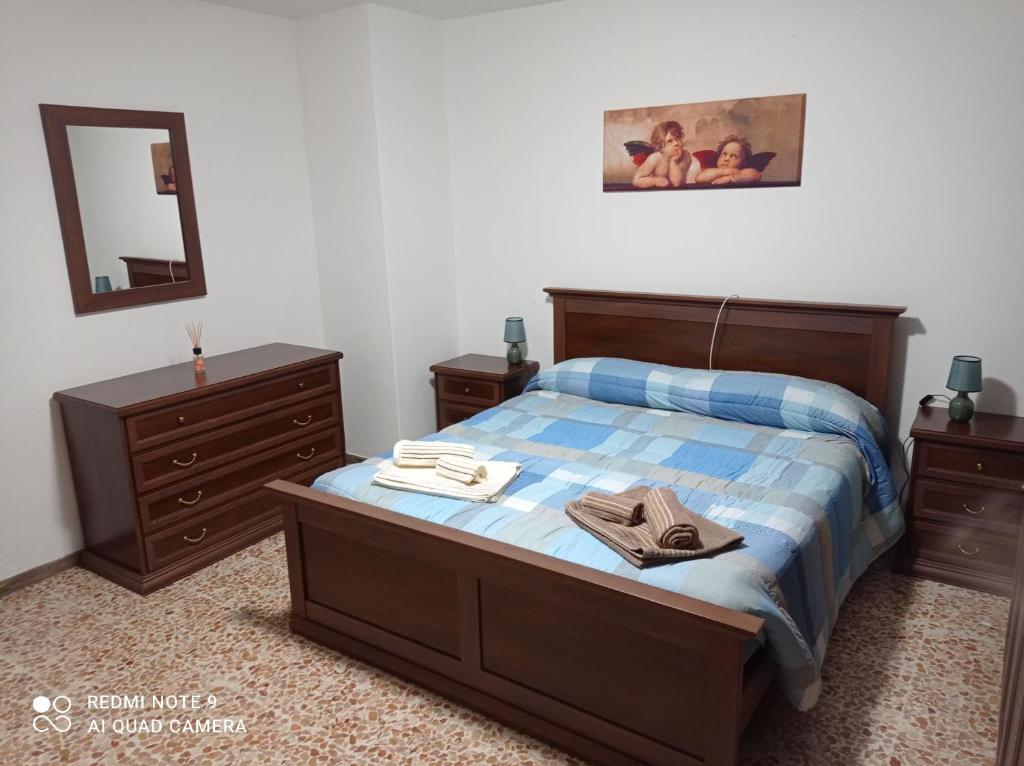 Een bed of bedden in een kamer bij Da nonna Pina