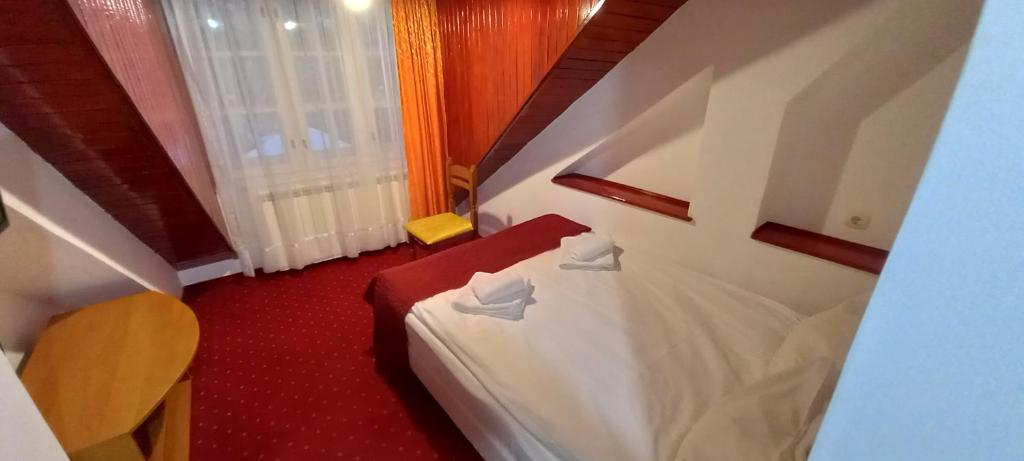 Postel nebo postele na pokoji v ubytování Mountain Breeze