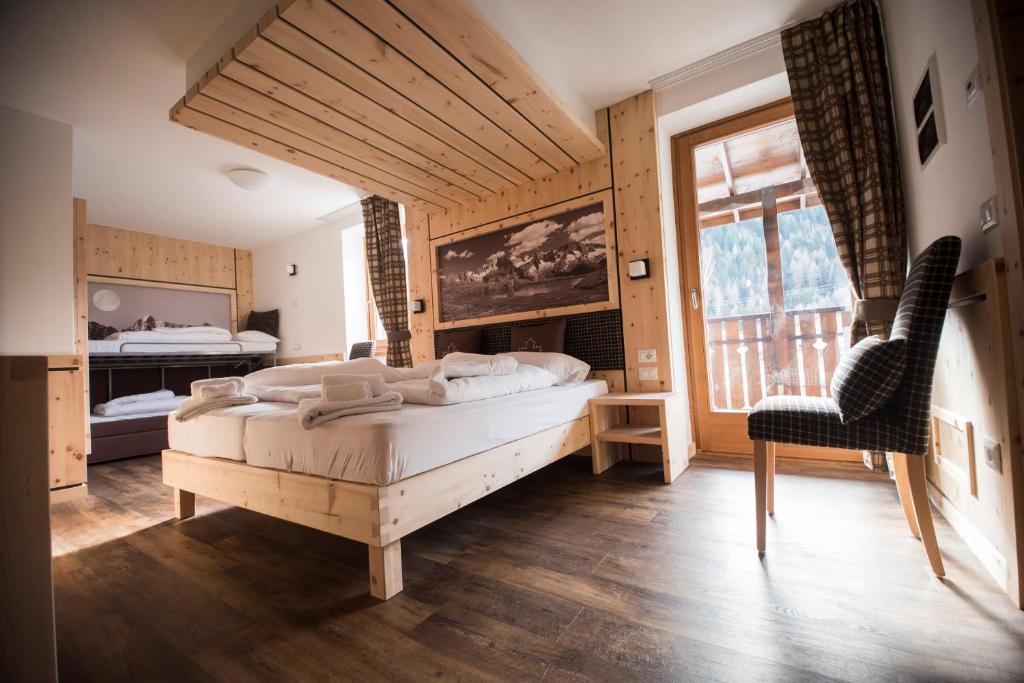 Postel nebo postele na pokoji v ubytování Hotel Niagara