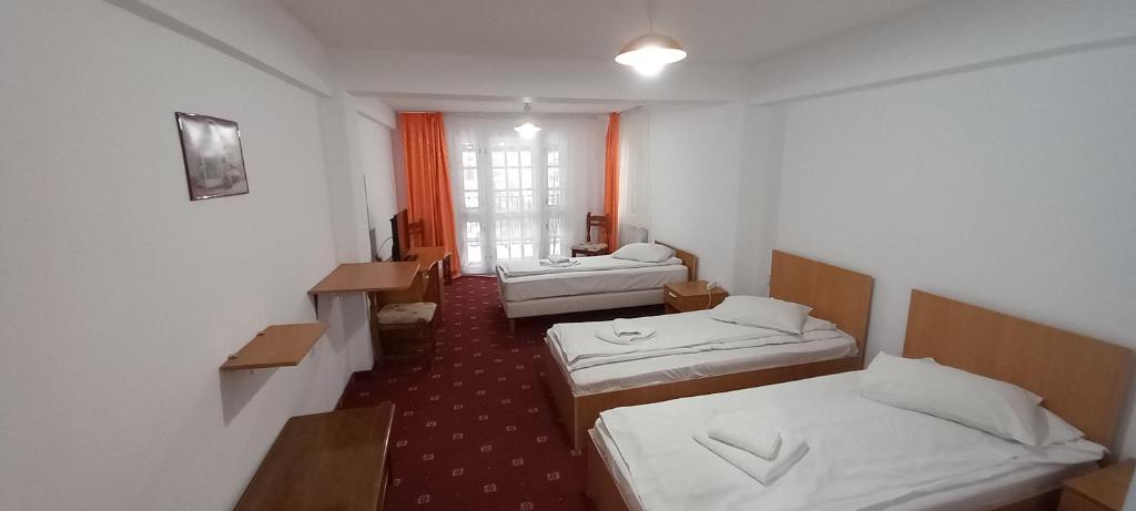 Postel nebo postele na pokoji v ubytování Mountain Breeze
